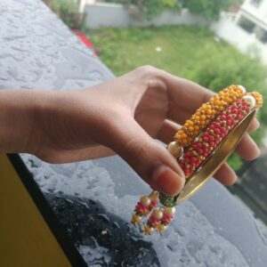 Traditional Red & Yellow Beaded Gold Tone Designer Bangle with Pearl Drops